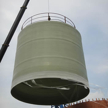 A vertical FRP tank is demoulded from the mandrel with the help of hoist machine.