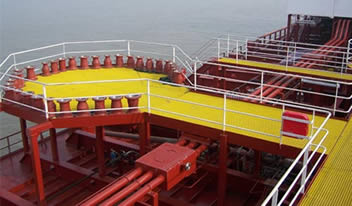 Yellow FRP ship deck grating in marine areas for corrosion protection.