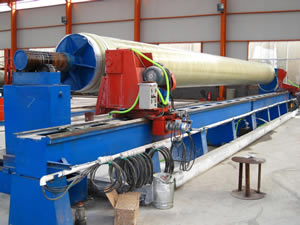 A trimming machine is under operation for mandrel making.
